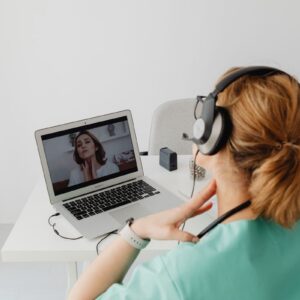 Patient having an online telehealth appointment with a doctor for hormone therapy